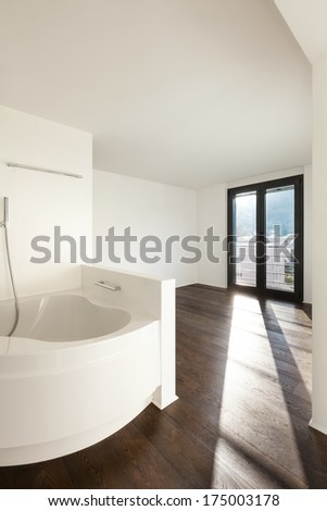 beautiful interior of a new apartment, view bathtub