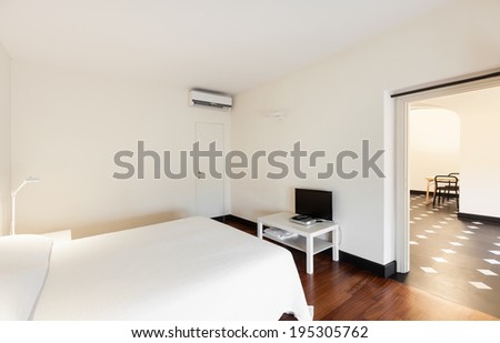 Interior house, white bedroom, double bed