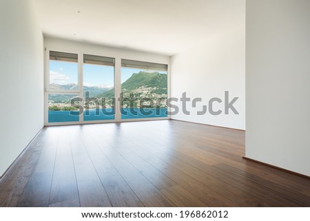 beautiful modern house, empty room with window overlooking the lake