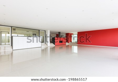 Interior modern villa, wide living room, red walls
