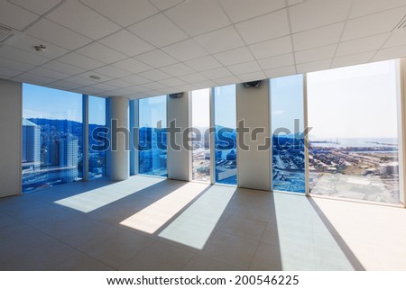 Empty room with big panoramic window