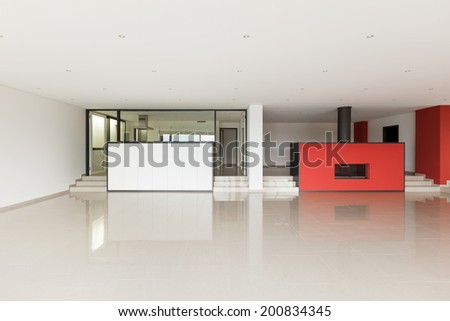Interior modern villa, wide living room, red walls
