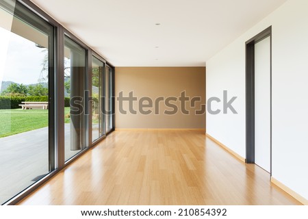 Interior modern villa wide living room with large windows Interior modern villa wide living room with large windows