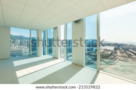 Interior, wide open space, skyscraper, windows overlooking the sea