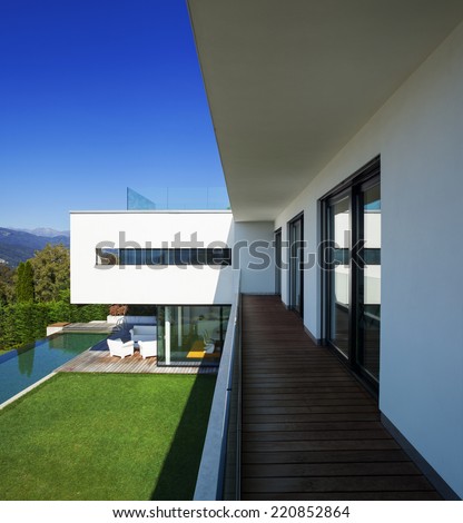 Modern house with pool and garden, summer time
