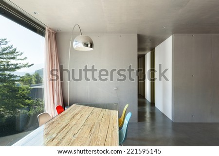 Interior modern house, dining room, concrete wall