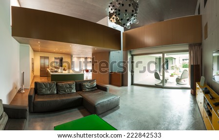 beautiful modern house in cement, interiors, view from the living room