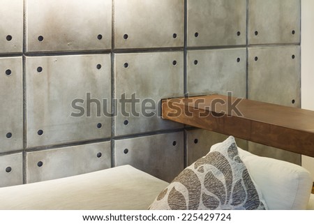 Interior of modern house, detail living room, decorative concrete wall