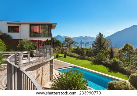 Modern villa with pool, view from the passage