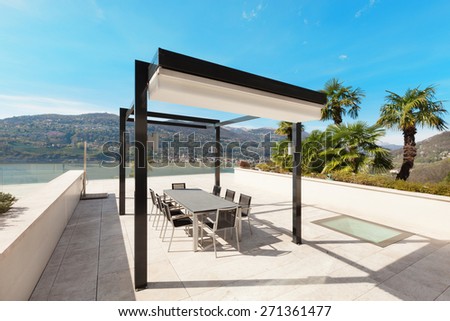 architecture, modern house, beautiful veranda overlooking the lake