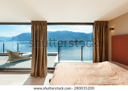 Interior, beautiful modern penthouse, bedroom