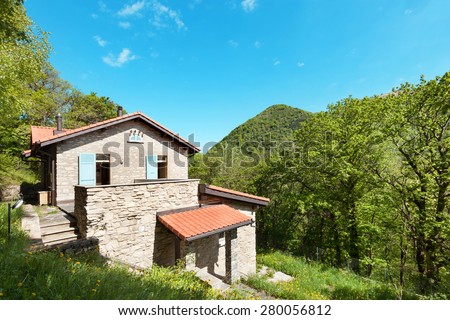 country house in the woods, stone walls, external