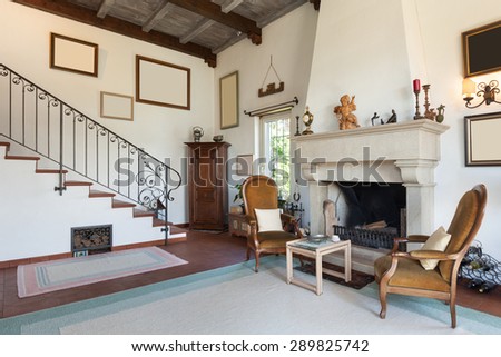 interior of old house, classic furniture, living room with fireplace