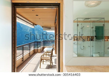 Interior of a modern apartment, balcony view from the bathroom