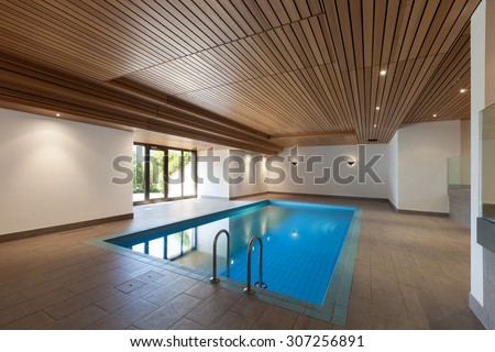luxury apartment with indoor pool, wooden ceiling