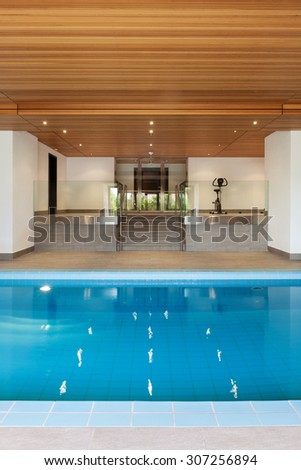 luxury apartment with indoor pool, wooden ceiling