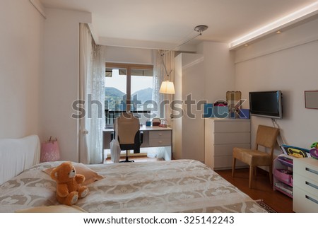 Interior of house, children room with double bed