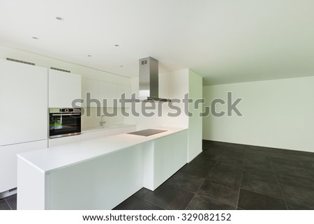 interior of new apartment, white domestic kitchen