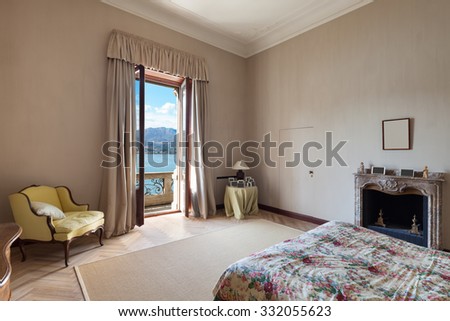 Interior of an old mansion, new bedroom in classical style