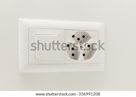 Interior home, light switch and electrical outlet