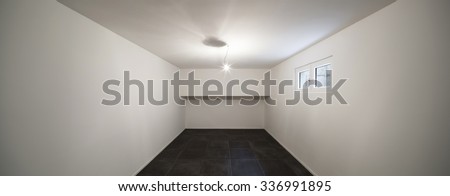 Architecture, modern house, empty room with tiled floor black