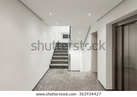 Interior of a modern apartment building, corridor with elevator