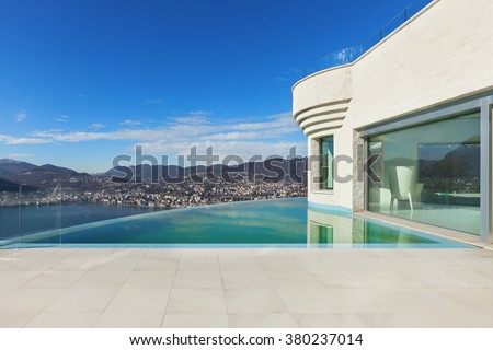 Architecture, beautiful modern house with infinity pool, exterior