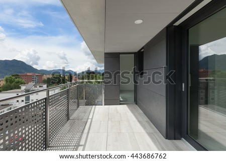 Architecture contemporary, balcony of a building, cloudy sky