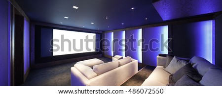 Home theater, luxury interior, comfortable divan and big screen