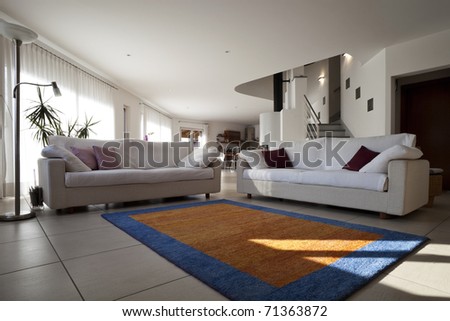 new apartment, white sofa in large living room