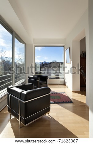 interior of a modern apartment, room with panoramic window