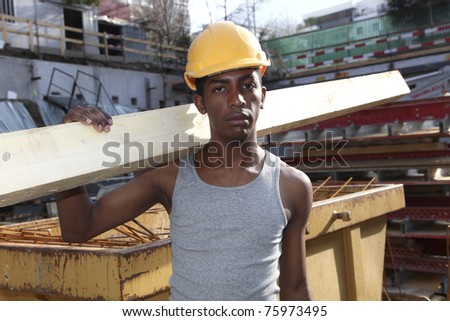 young black man working in the yard