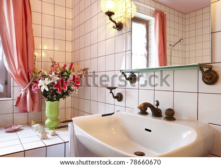 lovely bathroom in style classical, sink and mirror