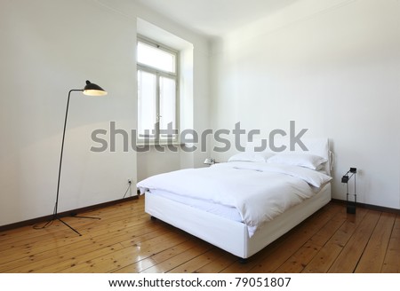 nice apartment refitted, bedroom with a double bed and lamps