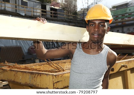 young black man working in the yard
