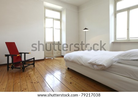 nice apartment refitted, bedroom with a double bed and chair