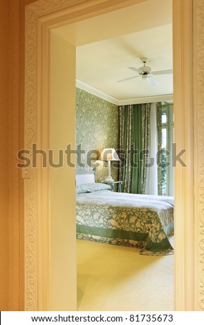 interior luxury apartment, comfortable bedroom, view from corridor