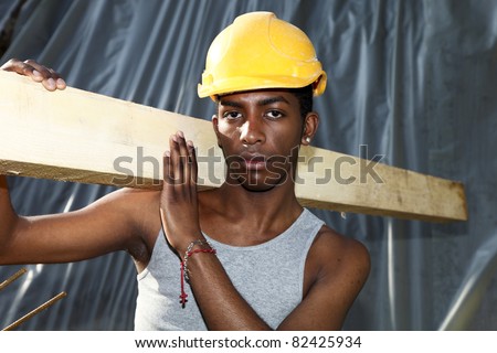 young black man working in construction site
