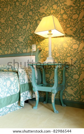 interior luxury apartment, comfortable bedroom, table lamp