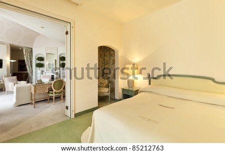interior luxury apartment, comfortable bedroom and lounge view