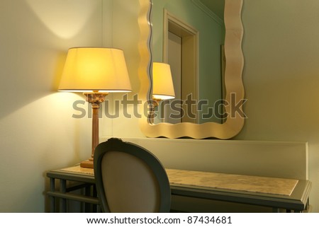 interior luxury apartment, comfortable room, mirror and desk