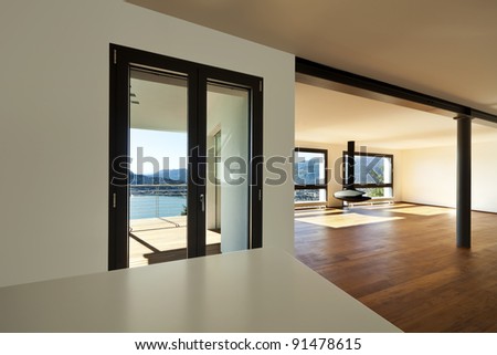 Modern apartment, large living room with panoramic view