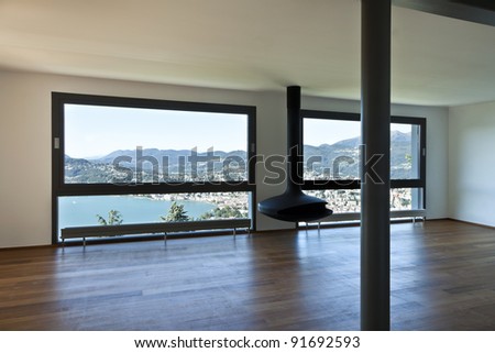 Modern apartment, large living room with panoramic view