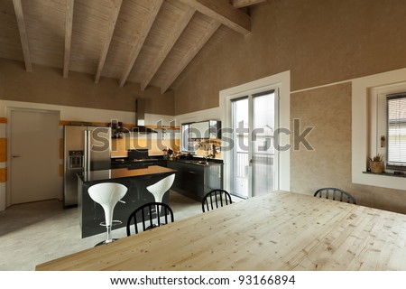 interior, new loft furnished, view of dining table and kitchen
