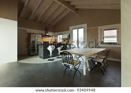 interior, new loft furnished, view of dining table and kitchen