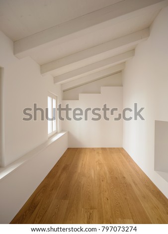 White room. On the wall there is a staircase. Nobody inside