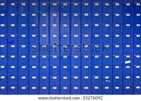 Long wall of blue Post Office boxes - landscape interior