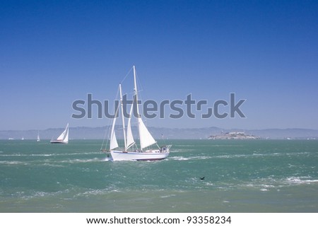 Yacht sails under fresh wind