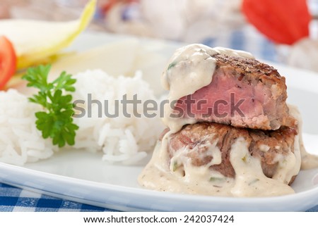 calf fry with rice and mushrooms sauce