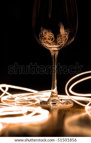 wine glass with a string of light around it